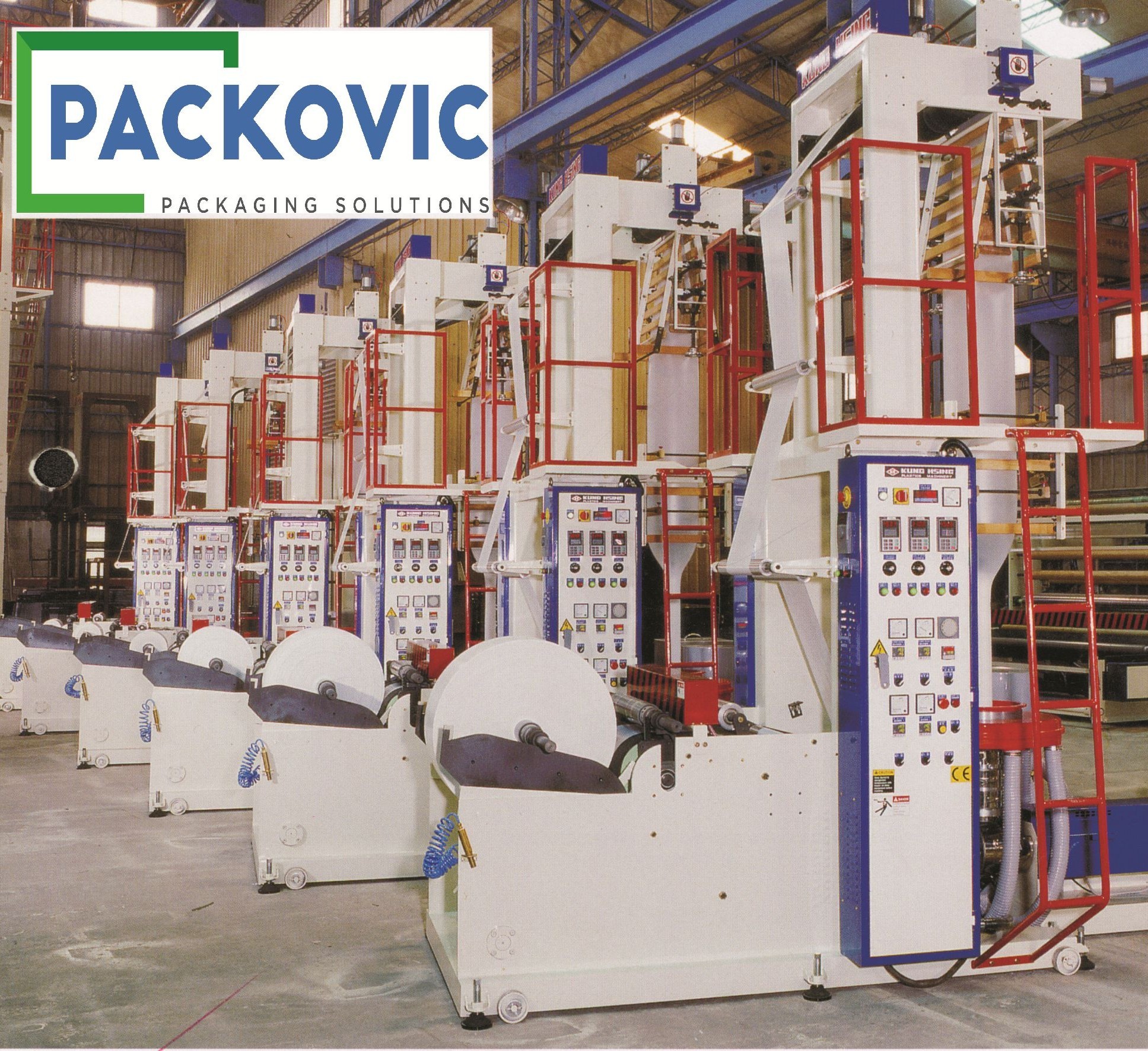 modern packaging manufacturing facility interior, industrial equipment, professional photography